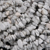 Close-up of small white and gray pebbles
