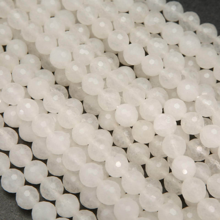 Faceted white jade beads.