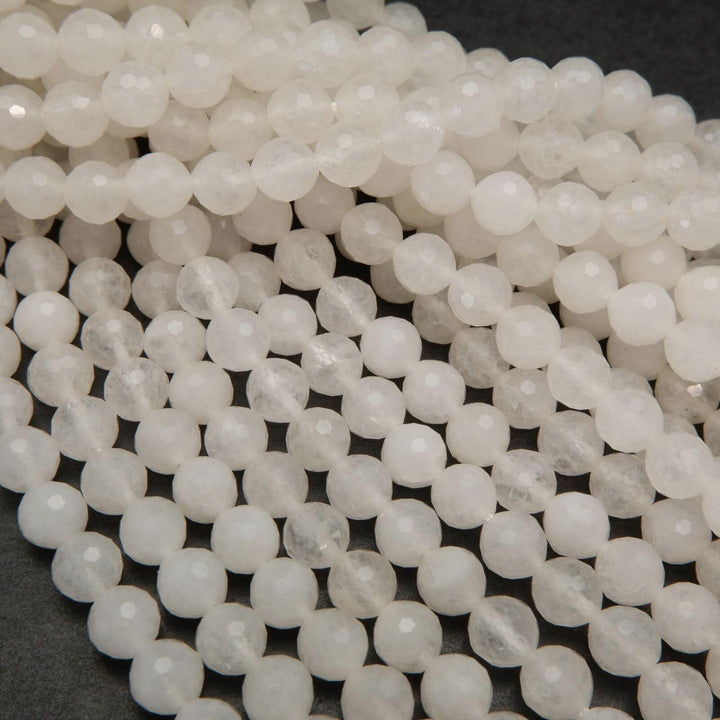 Faceted white jade beads.