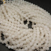 Faceted white jade beads.
