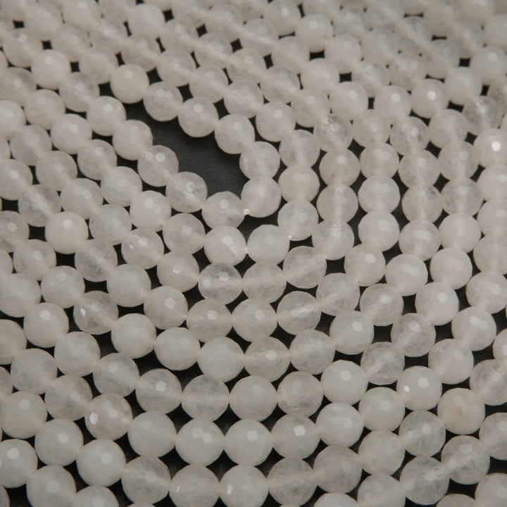 Faceted white jade beads.