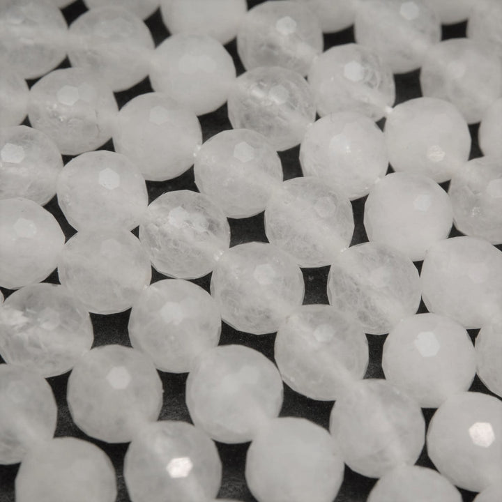 Faceted white jade beads.