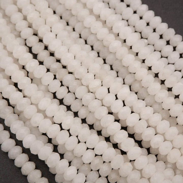 White jade faceted rondelle beads.