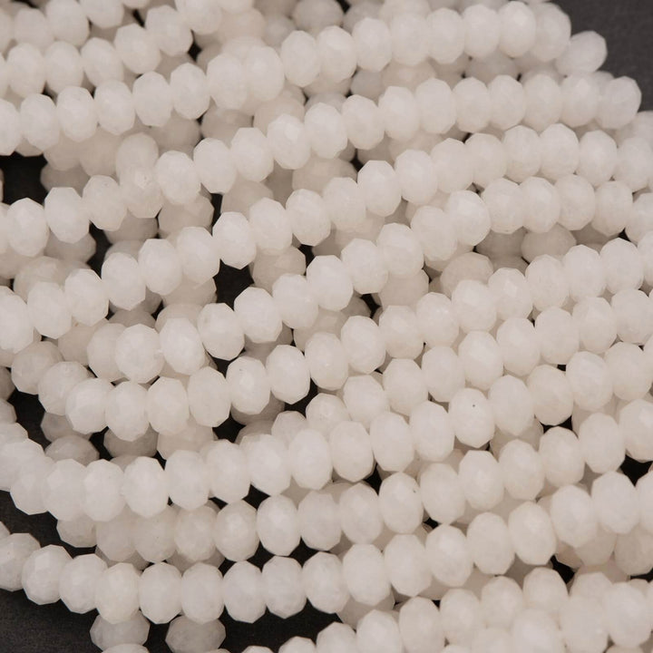 White jade faceted rondelle beads.