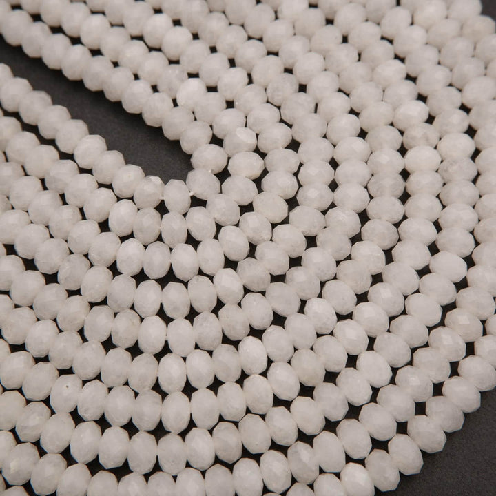 White jade faceted rondelle beads.