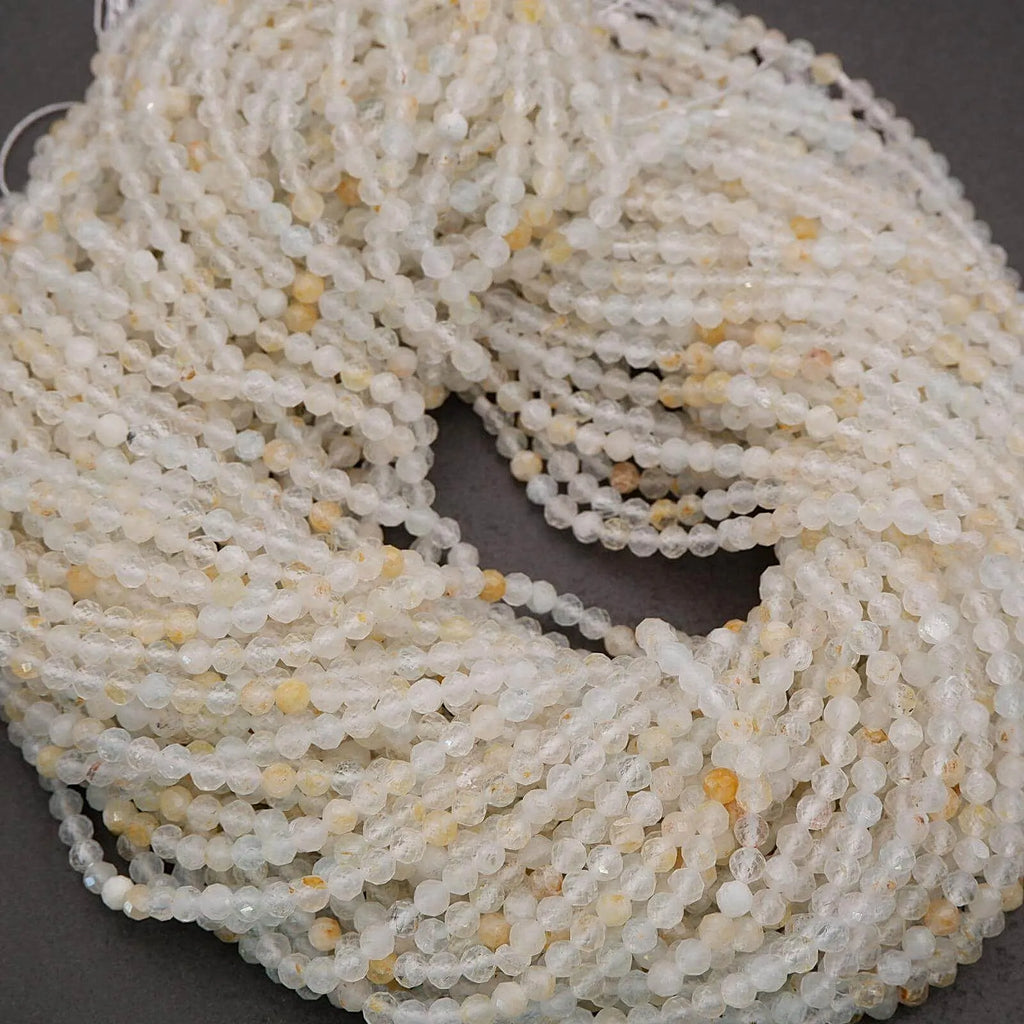 Close-up of a string of small, round beads on a dark background