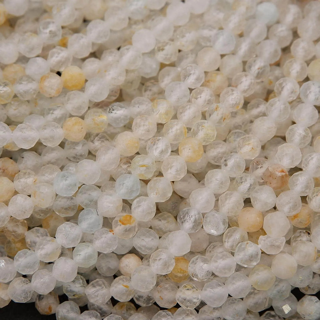 Close-up of small, round, translucent beads with a slight yellow tint.