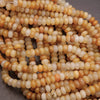 Rondelle Yellow and White Beads.