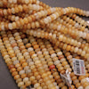 Rondelle Yellow and White Beads.