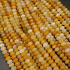 Yellow jade beads.