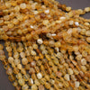 Close-up of amber-colored beads on a dark background