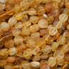 Close-up of amber-colored beads