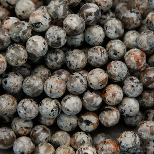 Close-up of a pile of small, round, multicolored stones.