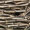 Black and white elongate tube bone beads.