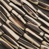 Black and white elongate tube bone beads.