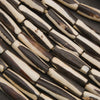 Black and white elongate tube bone beads.