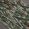 African bloodstone rectangular beads featuring forest green, smoky gray, and deep red mineral patterns.