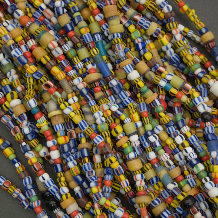 Close-up of colorful beads on a dark background