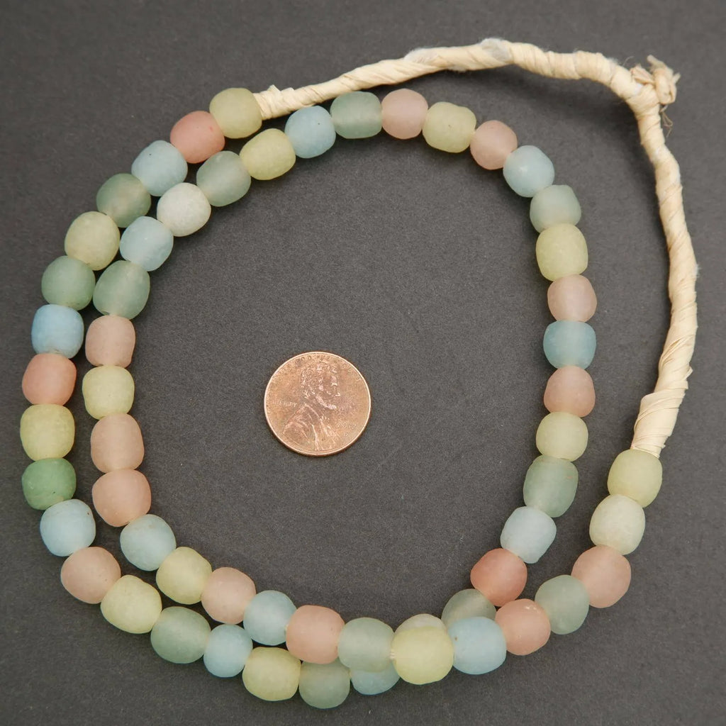 Necklace with pastel-colored beads on a dark gray background