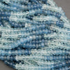 Close-up of blue beads on a gray background