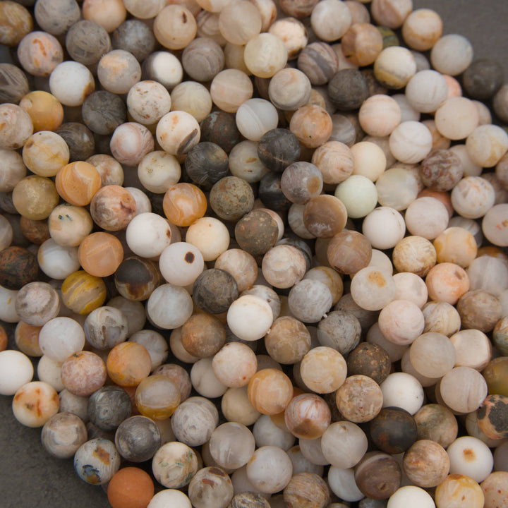 Bamboo Leaf Agate gemstone beads with soft banding and mottled patterns