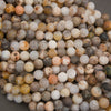 Strands of Bamboo Leaf Agate round beads in neutral earthy shades