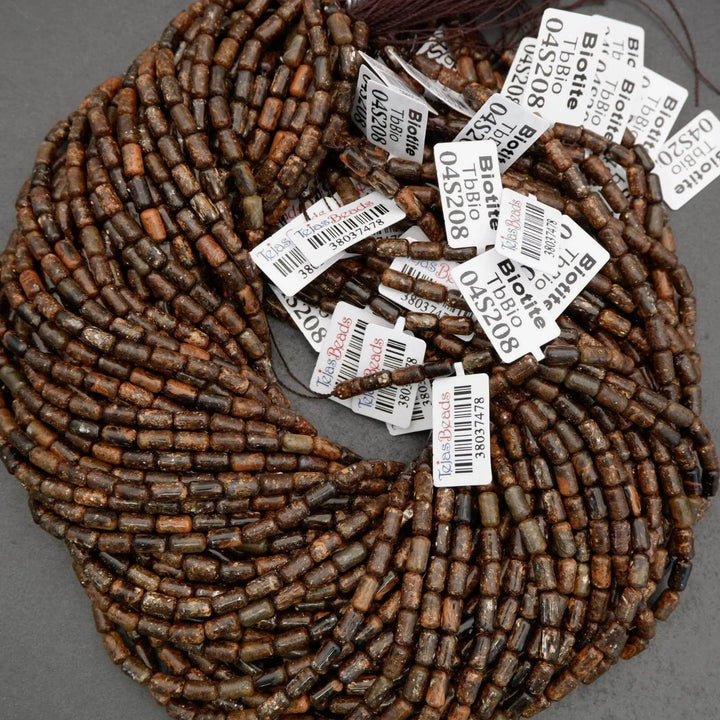 Beads with labels on a gray background