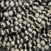 Close-up of black and white beads