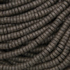 Black lava stone heishi beads with a matte finish and naturally porous volcanic texture for jewelry making.