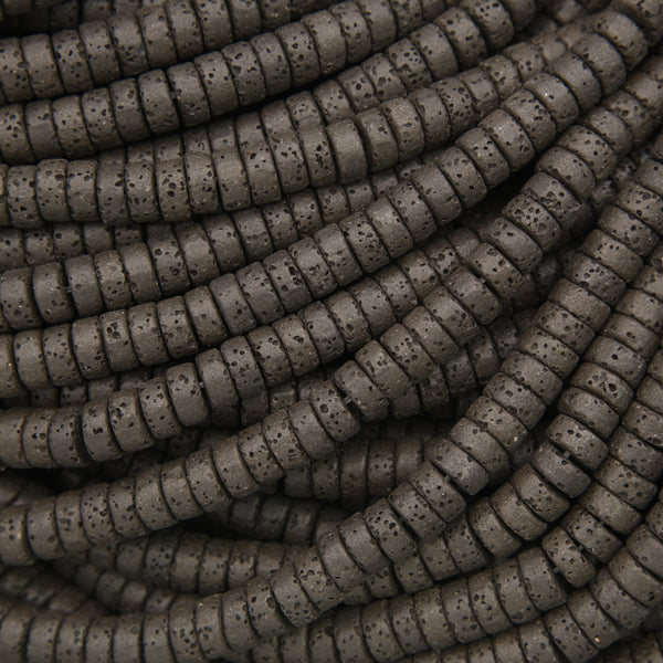 Black lava stone heishi beads with a matte finish and naturally porous volcanic texture for jewelry making.