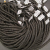 Natural black lava stone heishi gemstone beads with a rustic texture for handmade bracelets and necklaces.