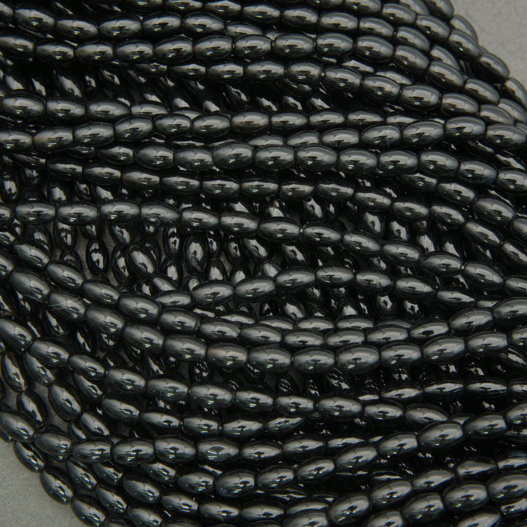 Black onyx spacer beads oval shape high polish deep black color