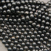 Glossy Black Tourmaline round beads with subtle natural color variation
