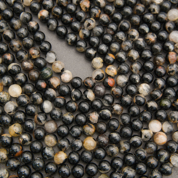 Polished Black Tourmaline in Quartz beads with natural black and white variation