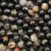 Black Tourmaline in Quartz round beads with cream and gray mineral patches