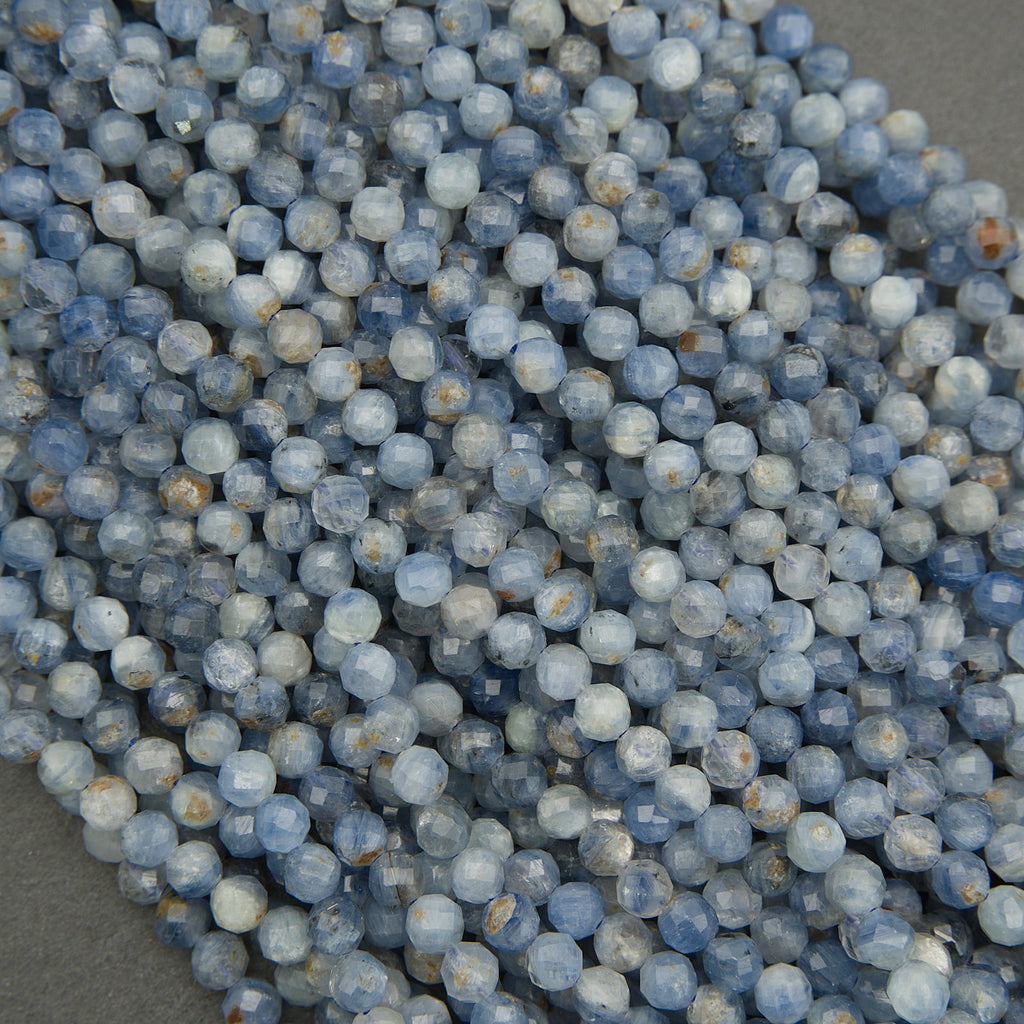 Close-up of blue beads on a gray background