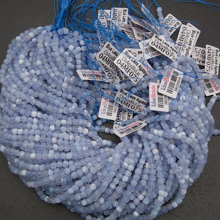 bundle of blue lace agate beads with tags