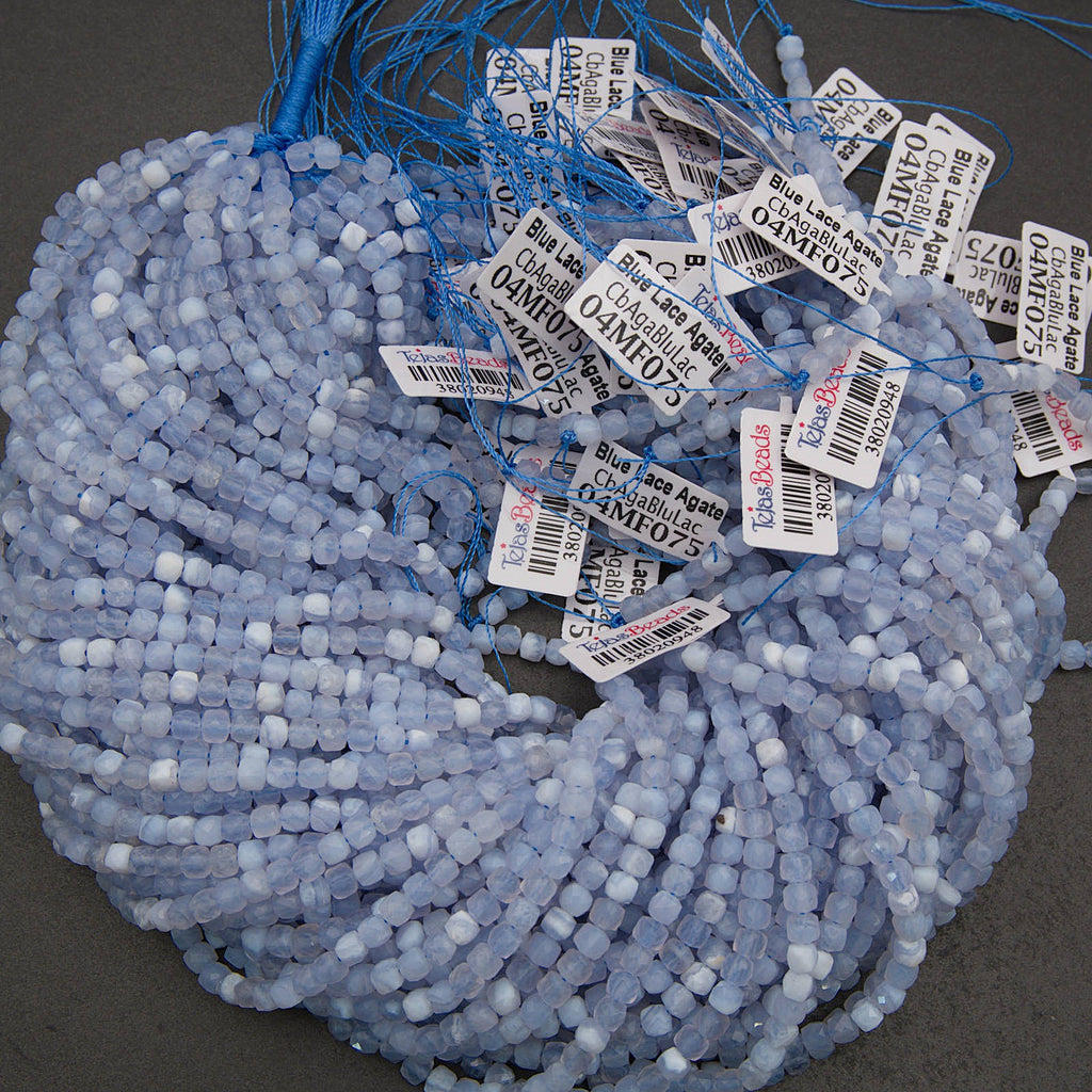 bundle of blue lace agate beads with tags