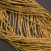 Ethiopian brass tube beads, slim cylindrical spacers with warm gold tone and satin finish