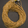 Minimalist brass spacer beads, thin tube shape in warm matte gold tones