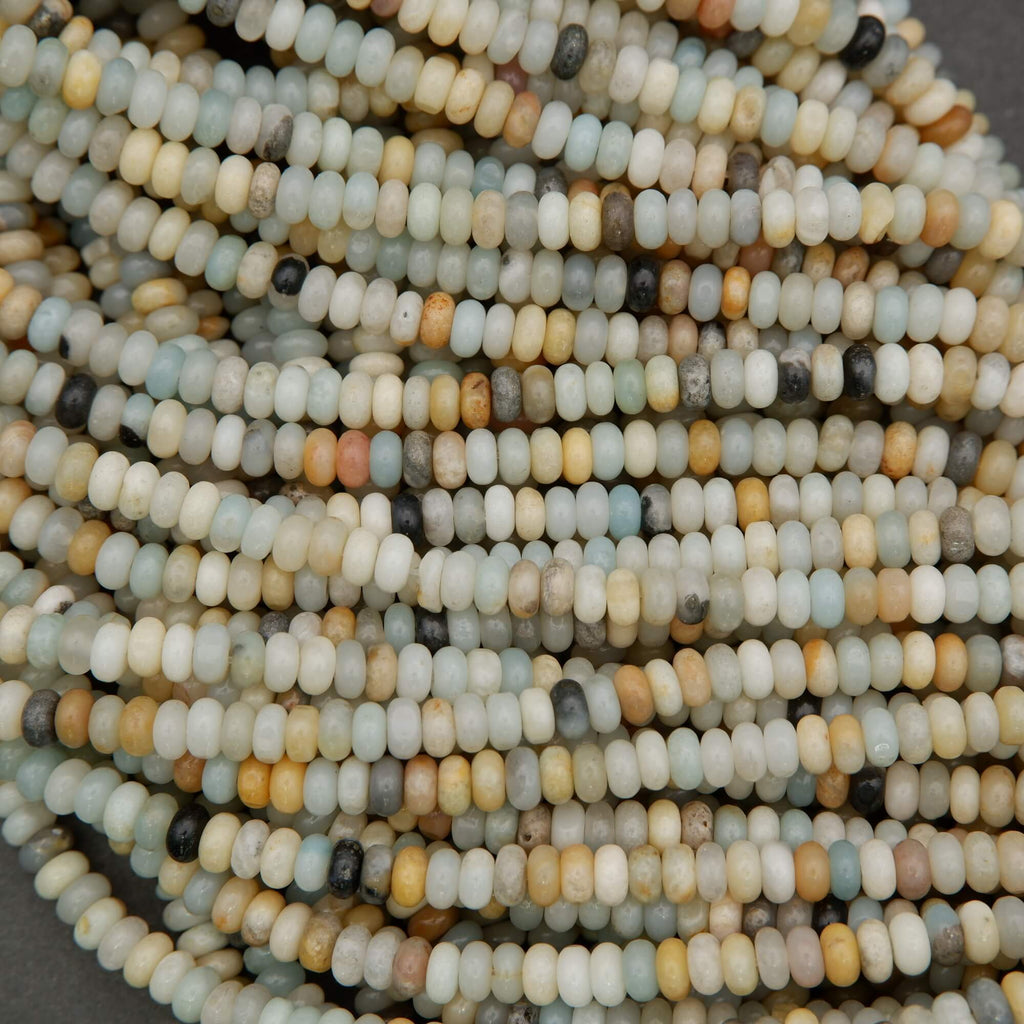 Amazonite spacer beads smooth rondelle shape blue cream and tan variation