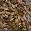 A heap of smooth oval bronzite bead strands in bronze, golden brown and chocolate