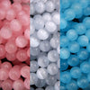 Three rows of pink, white, and blue round beads respectively.