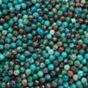 Close-up of microfaceted round chrysocolla beads in turquoise and teal with brown and dark matrix