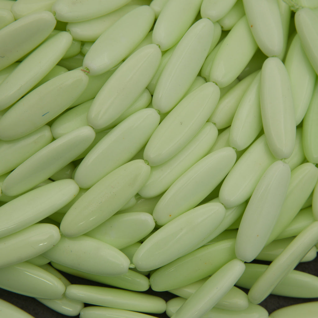 Close-up of light green oval-shaped objects