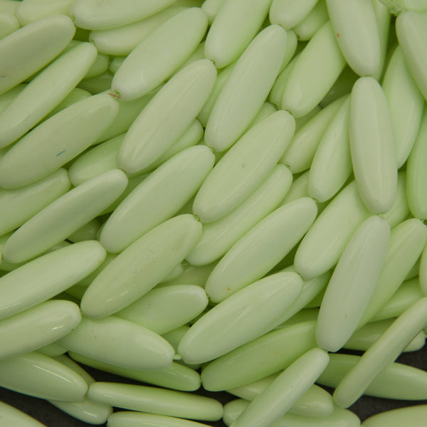 Close-up of light green oval-shaped objects