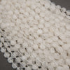 Natural clear quartz gemstone beads featuring elegant octagonal shapes and delicate internal veining.