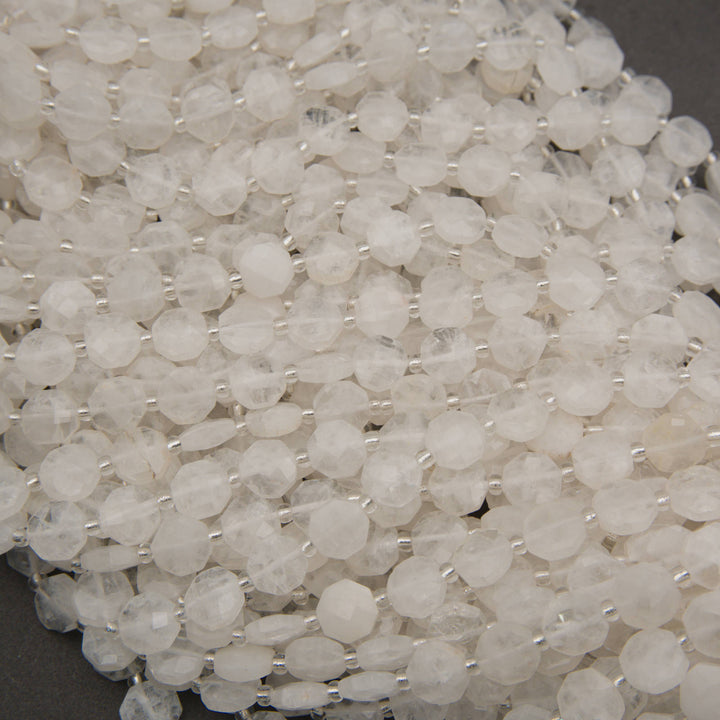 Translucent white quartz octagon beads with sparkling facets and natural cloudy inclusions.