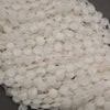 Translucent white quartz octagon beads with sparkling facets and natural cloudy inclusions.