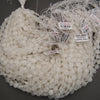 Translucent white quartz octagon beads with sparkling facets and natural cloudy inclusions.